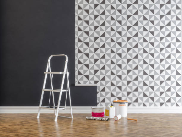 istock Glueing Wallpapers for Apartment During Renovation 1178781118