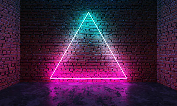 istock Triangle shaped glowing neon frame on brick wall in dark room 1178781196