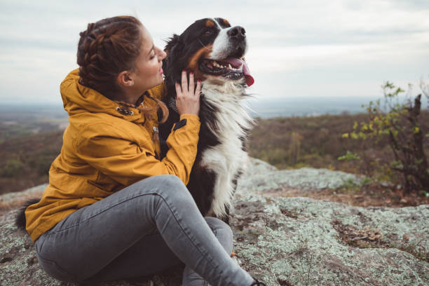 istock Young woman with dog 1178781590