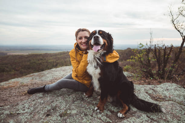 istock Young woman with dog 1178781733