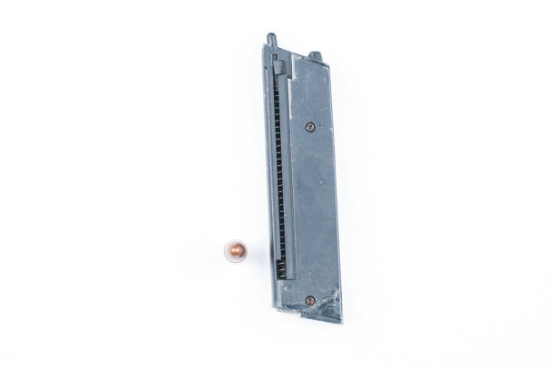 istock Gun and bullet isolated on white background.Copy space. 1178782818