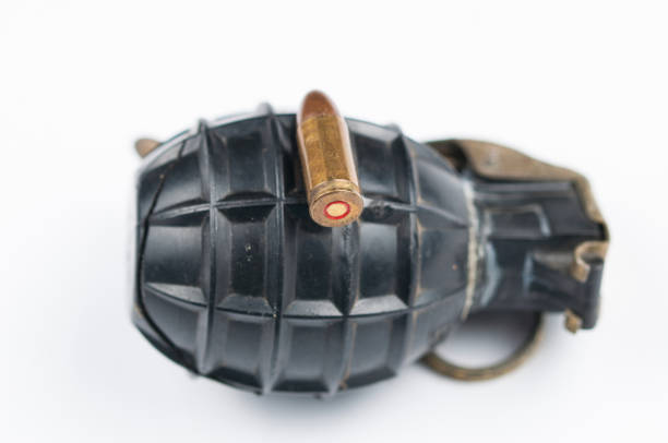 istock Bomb and bullet isolated on white background.Copy space. 1178782875