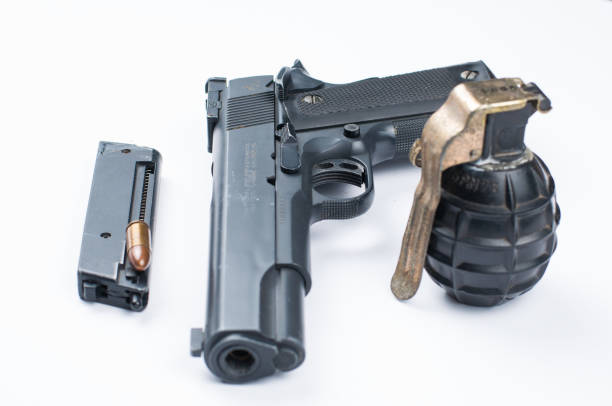 istock Bomb and bullet and gun isolated on white background.Copy space. 1178782965