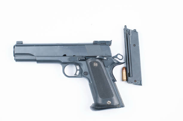 istock Gun and bullet isolated on white background.Copy space. 1178783141