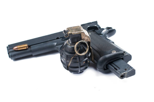 istock Bomb and bullet and gun isolated on white background.Copy space. 1178783150