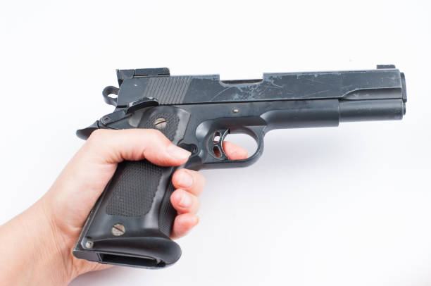 istock Gun and bullet isolated on white background. 1178783275