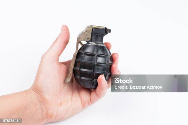 Bomb In Hand Isolated On White Backgroundcopy Space Stock Photo - Download Image Now