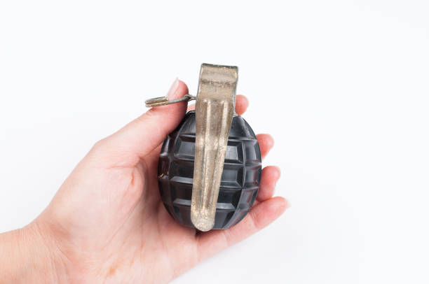 istock Bomb in hand isolated on white background.Copy space. 1178783555