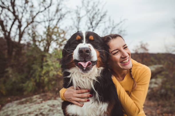 istock Young woman with dog 1178784410