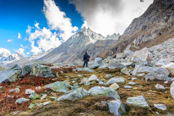 Man hiking on beautiful Himalayas mountains with backpack. Travel Lifestyle wanderlust concept Hampta pass, India- October 05, 2017: Man hiking on beautiful Himalayas mountains with backpack. Travel Lifestyle wanderlust concept lahaul and spiti district photos stock pictures, royalty-free photos & images