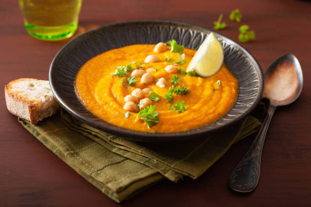 istock creamy carrot chickpea soup on dark rustic background 1178787698