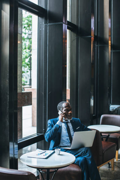 istock Businessman Workin g at Cafe 1178788142