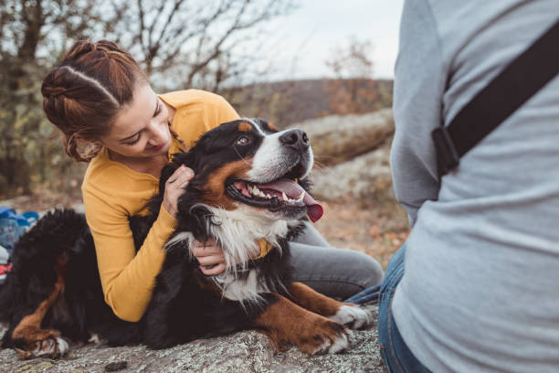 istock Young woman with dog 1178788294