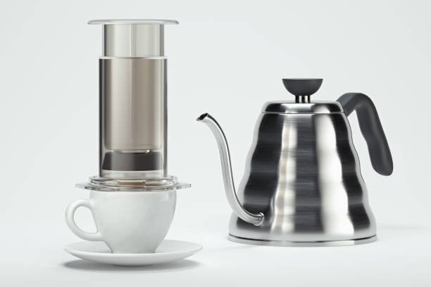 istock freshly prepared black coffee in modern gray maker near white coffee cup. Alternative brewing. 3d rendering 1178790135