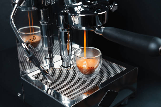 istock Metallic clean silver coffee machine in process of making fresh coffee. Preparing coffee at home. Home barista. 1178793467