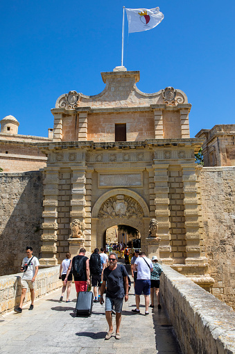 Mdina, Malta - August 14th 2019: The main gate of the historic city of Mdina in Malta.  Mdina served as the capital of Malta from antiquity to the medieval period.