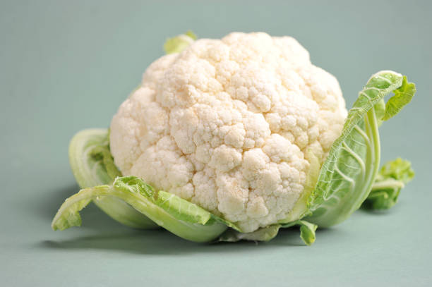 istock Head of cauliflower on a light background.  Close-up.  Macro shot. 1178797541