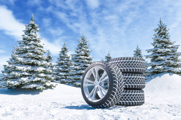 istock Snow tires on winter landscape background 1178801255