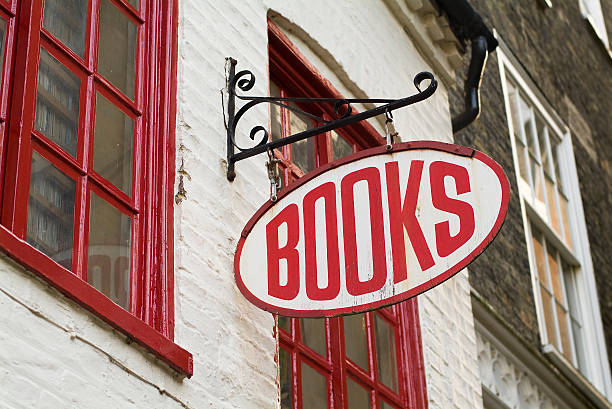 Books: Bookstore sign - English language Sign of a traditional English bookstore, simply stating "books".  bookstore stock pictures, royalty-free photos & images