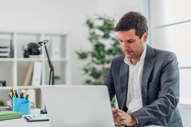 istock Businessman working on laptop 1178803773