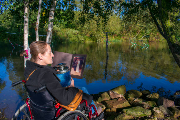 Disabled Woman Mourning Loss Of Husband stock photo