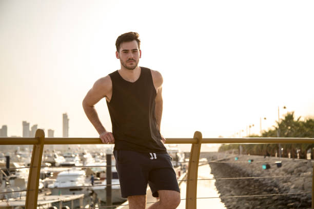 istock handsome guy posing near the marina 1178806051