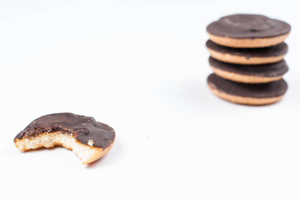 istock Chocolate cookies isolated on white background.Copy space. 1178806335