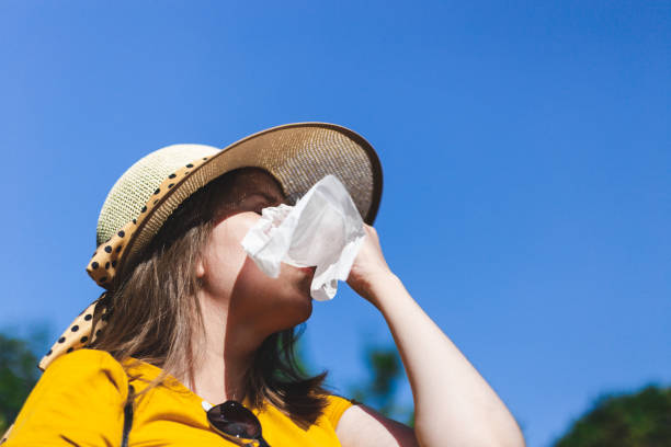 istock Woman blowing nose 1178807085