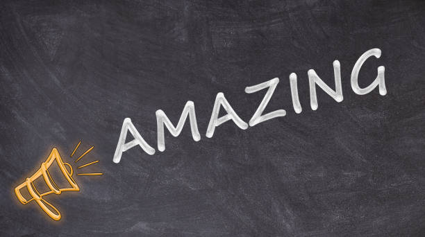istock Amazing written on blackboard with megaphone 1178807551