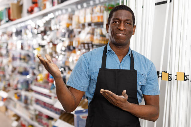 istock Active man offering for sale different supplies 1178808816
