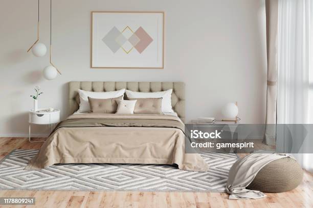 Cozy Bedroom In Warm Colors With Painting A Nightstand A Pouf And A Plaid Front View Stock Photo - Download Image Now