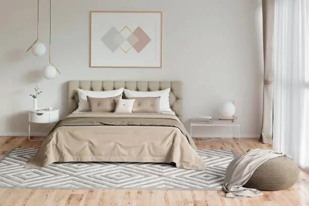 Photo of Cozy bedroom in warm colors with painting, a nightstand, a pouf, and a plaid. Front view