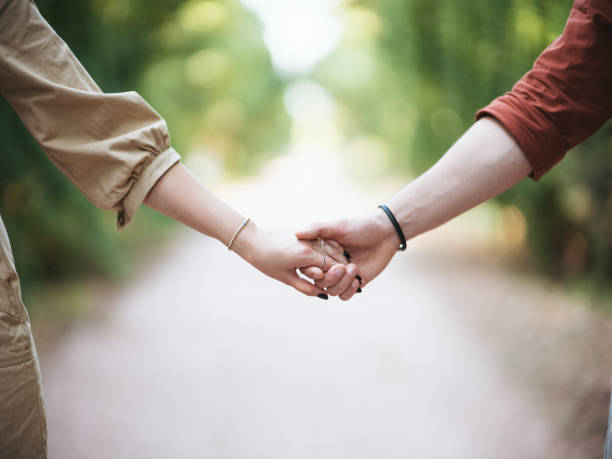 istock Rear view of a couple walking on the pathway 1178811407