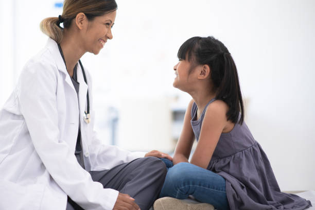 istock Girl getting a check up from pediatrician 1178814165
