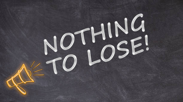 istock Nothing to lose written on blackboard with megaphone 1178814283