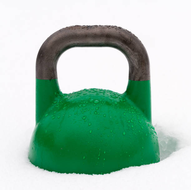 istock Frozen green gym kettlebell in the snow 1178817028