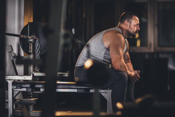 istock Man weightlifter at the gym 1178817794
