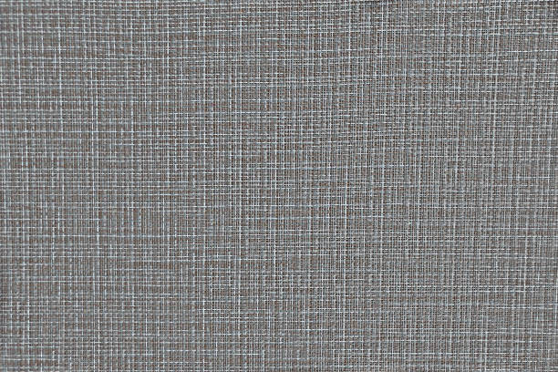 istock Fabric texture with intertwined gray, white and brown threads. Beautiful tissue texture for design. The background fabric with the filaments randomly intertwined. 1178819508