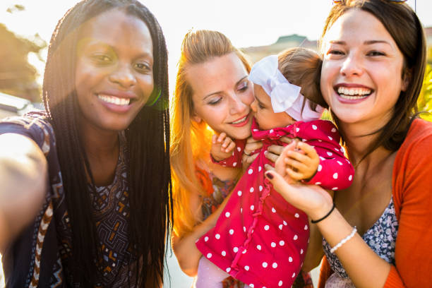 istock Multi ethnic female friends with kids 1178823474
