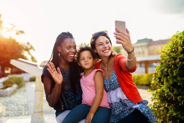 istock Multi ethnic friends taking selfie 1178823560