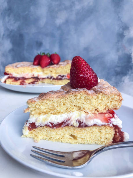 istock Victoria sponge cake decorated with strawberries 1178823730