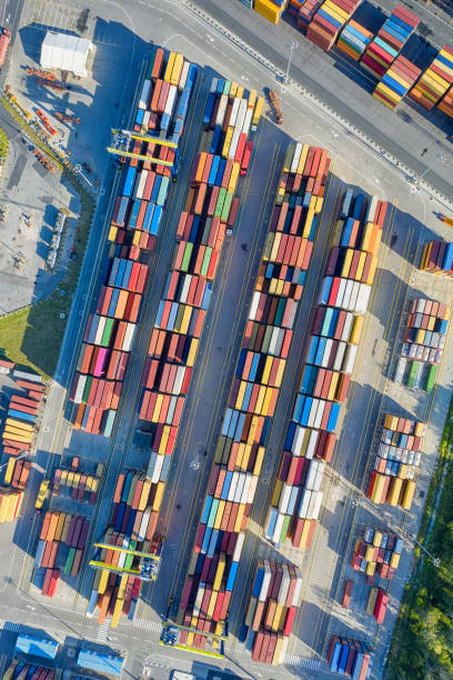 istock Top aerial view on cargo containers on the container site 1178827154