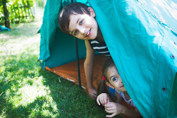 istock Happy kids in a tent 1178836238