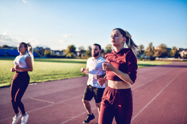 istock Athletes Running Together On Track 1178836572