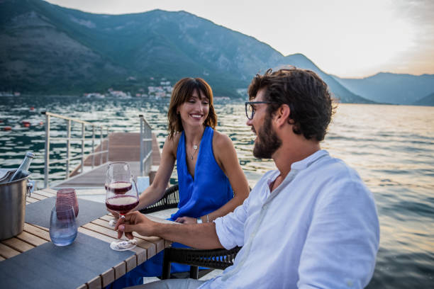 istock Couple on summer evening having romantic dinner 1178836796