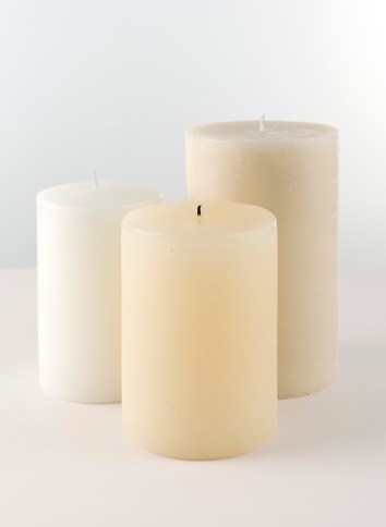 three cream candles