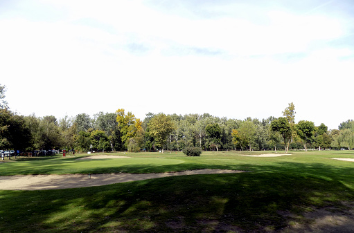 Grassland and artificial lake of Sunny World Golf Course