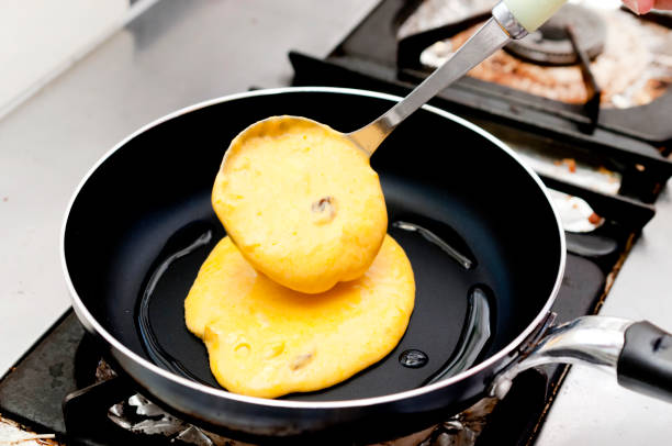 istock Baking pumpkin pancakes in kitchen. Steps of making cooking pancake 1178841669