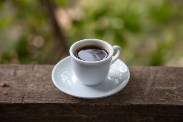 istock Black coffee cup in natural scene 1178850552