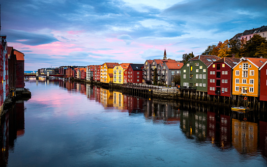 Trondheim view at sunset time from Old Town Bridge.\nNorway